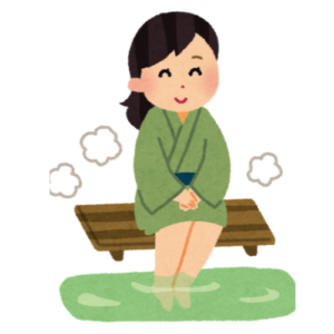足湯をしている女性の画像