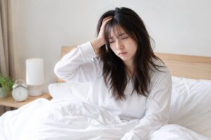 疲れが取れていない女性の画像